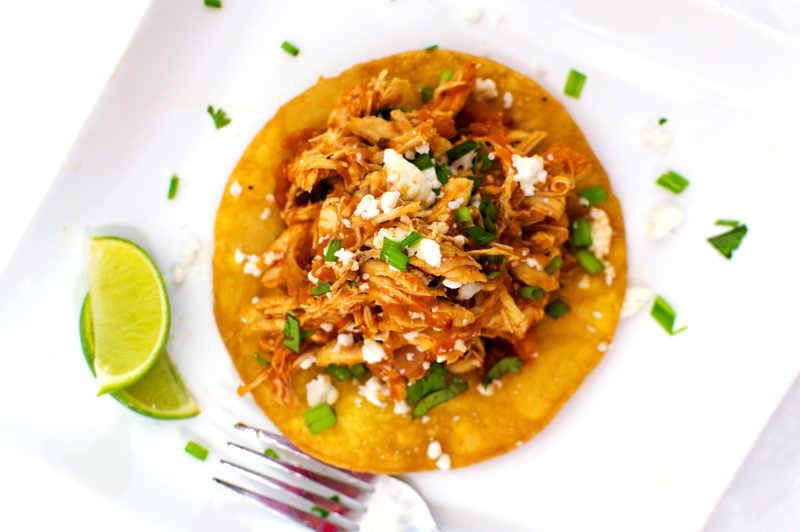 I adapted Food & Wine's Chicken Tinga Tacos and made some tostadas! They were absolutely delicious -- spicy like I like 'em! 