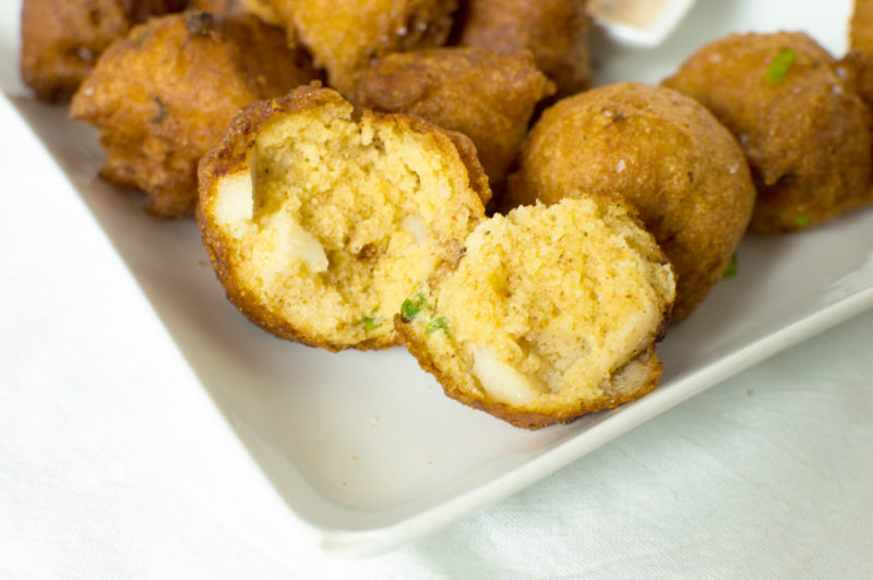 Fried buttermilk hushpuppies with shrimp, scallops, and scallions in every bite!