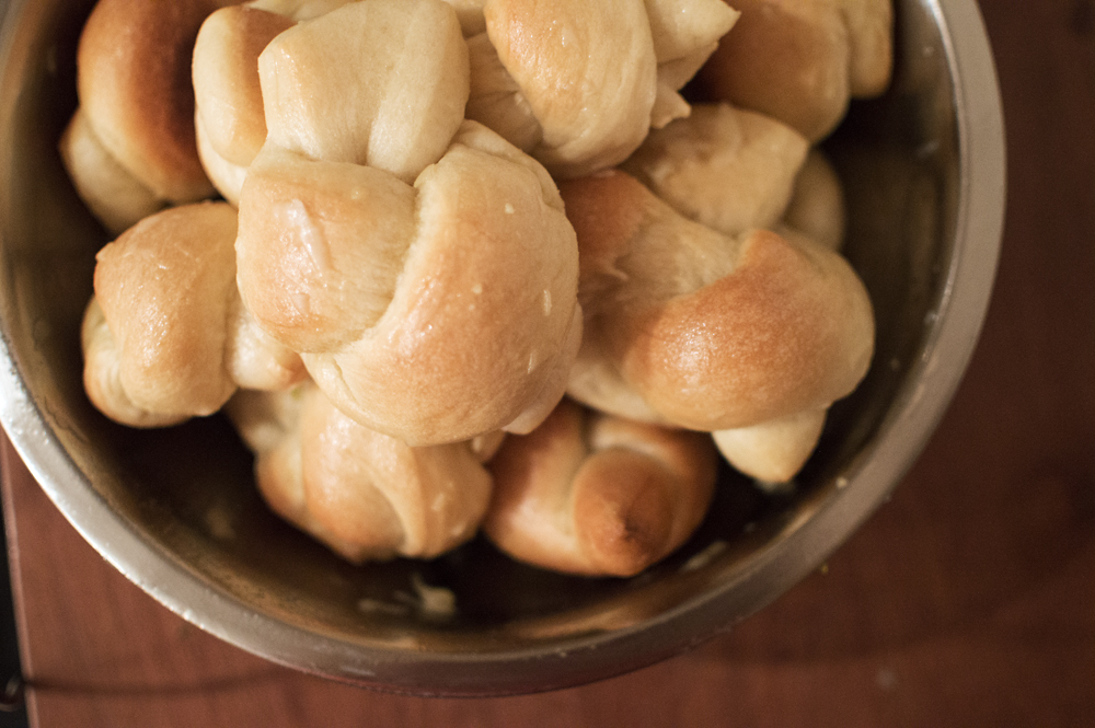 Simple, perfect garlic knots. After removing from the oven, toss in a garlic-butter-Parm mixture, then pass out when you take a bite.
