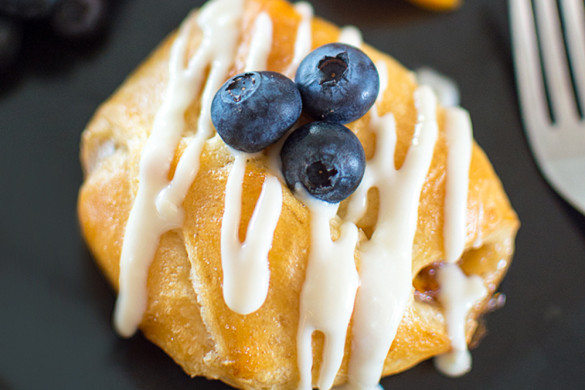 These peach croissants are an awesome breakfast or dessert with a sweet orangey, boozy topping.