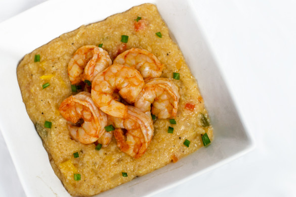 A one-pot shrimp and grits recipe that packs a spicy Sriracha punch.