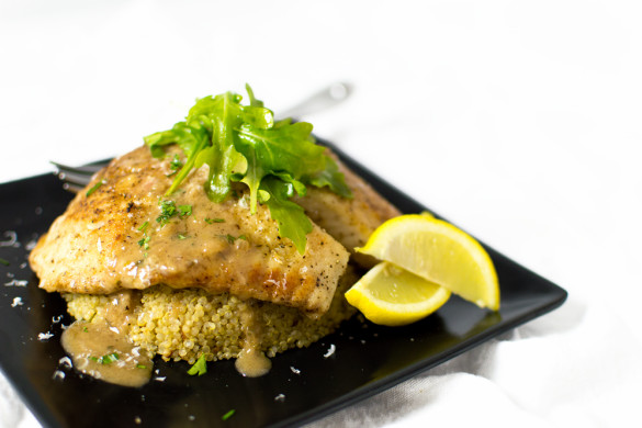 Pan-fried tilapia over a serrano-garlic quinoa topped with a bright, flavorful 4 herb Chardonnay sauce.