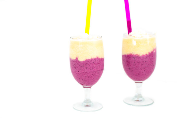 A healthy smoothie with layers of two flavors: sweet red berry and a tropical yellow layer. Plus they both include some protein -- what we all need more of!