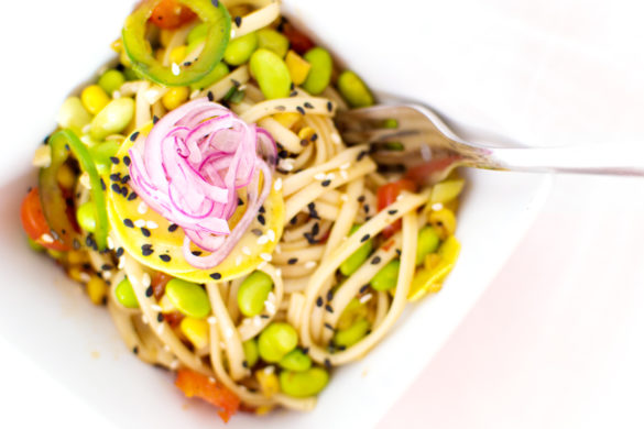 Udon noodles tossed with a spicy chili-garlic sauce with soy and hoisin. Then I added tons of fresh summer veggies.